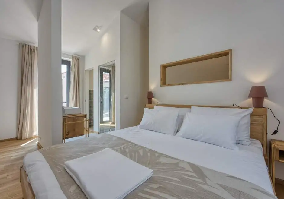 Case Atrio / Casa Nini