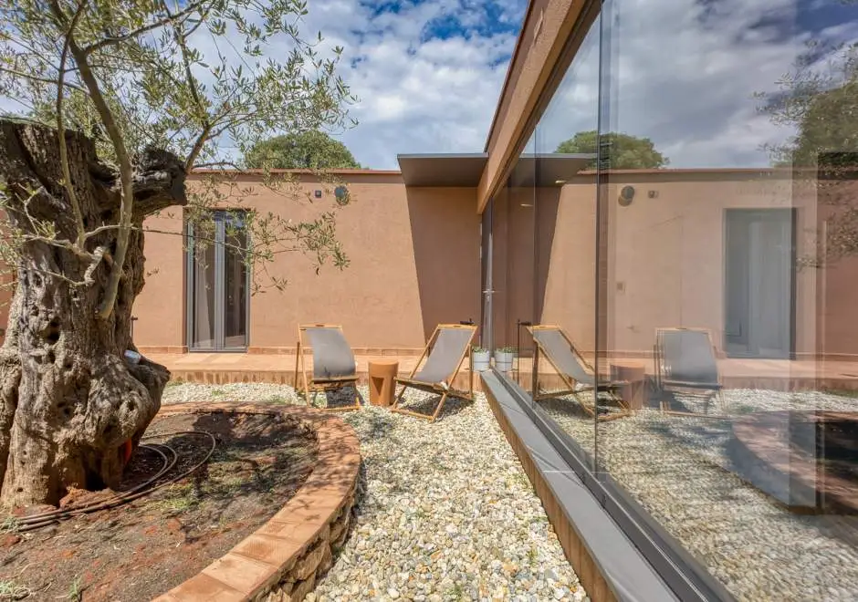 Case Atrio / Casa Nini