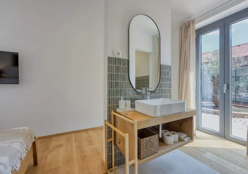 Case Atrio / Casa Nini