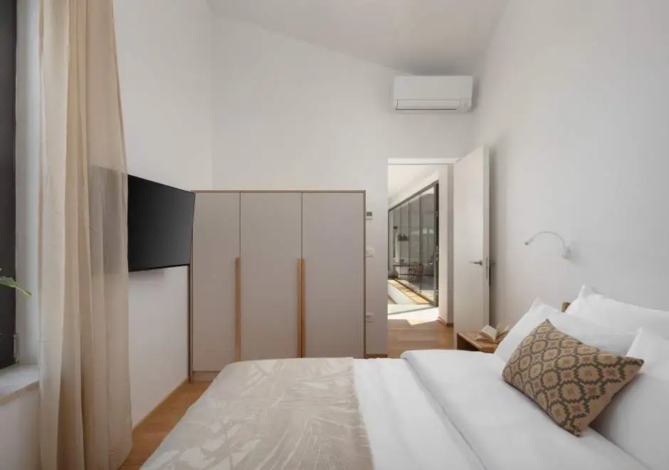 Case Atrio / Casa Nini