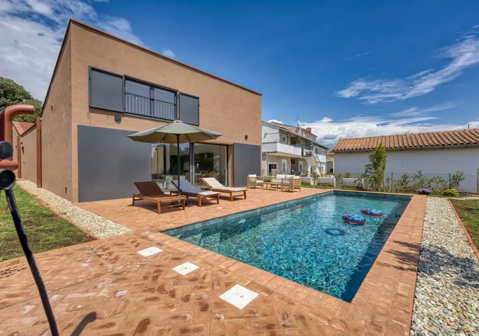 Case Atrio / Casa Nini