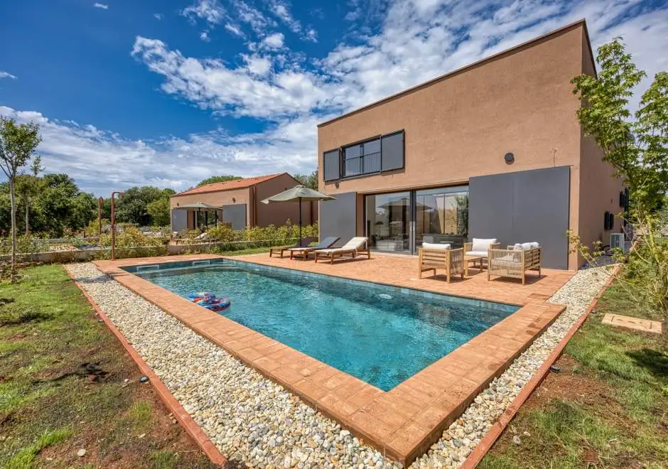 Case Atrio / Casa Nini