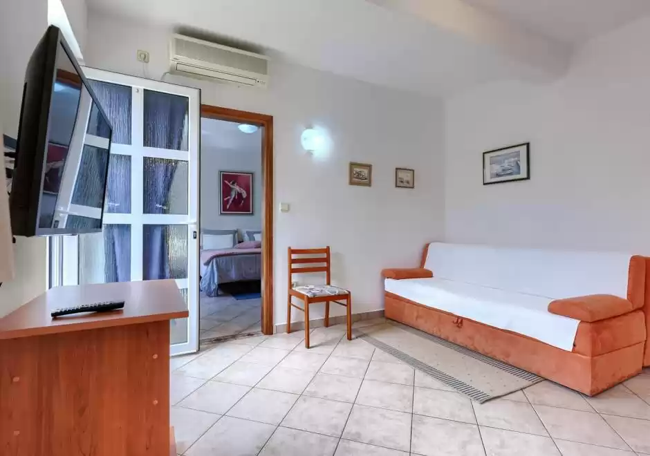 Apartman Nino A3 s terasom i zajedničkim bazenom