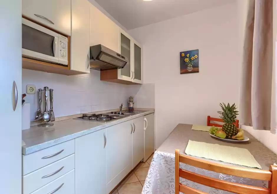 Apartman Nino A3 s terasom i zajedničkim bazenom