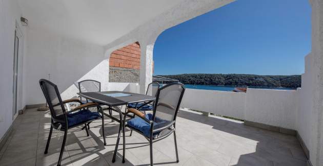 Appartamenti Korina / Appartamento A2 con balcone, a 100 metri dalla spiaggia - Isola di Rab