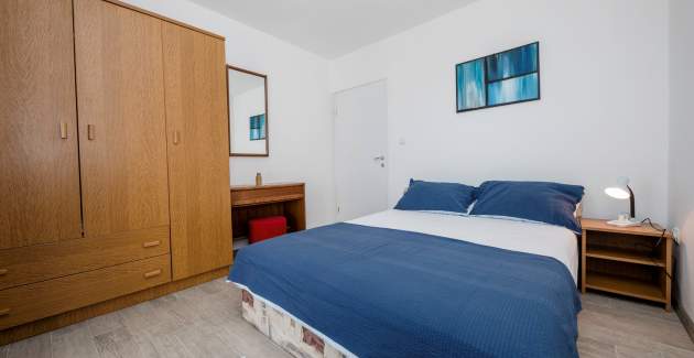 Appartamenti Korina / Appartamento A2 con balcone, a 100 metri dalla spiaggia - Isola di Rab