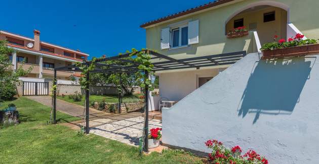 Apartment Stanko A4 mit dem Gartenblick in Fazana