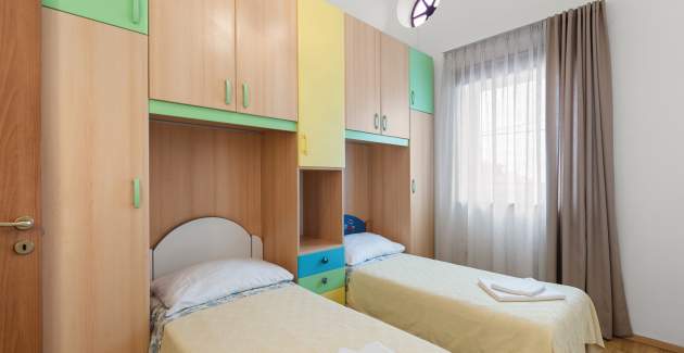 Apartment Noemi III mit 2 Schlafzimmern in der Villa Valtrazza mit Gemeinschaftspool