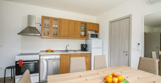 Spazioso Appartamento Residence Elody IV con Vista Piscina