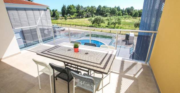 Two-Bedroom Apartment Residence Elody VI with Balcony and Pool View