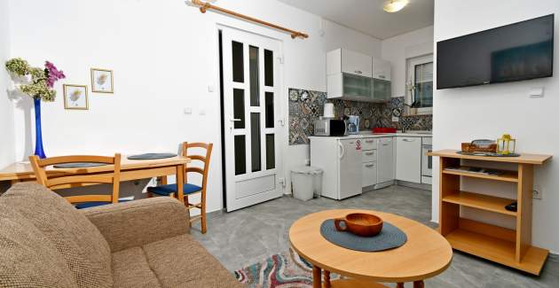 Apartments Novotny - Ein Schlafzimmer mit Terrasse - Zuti