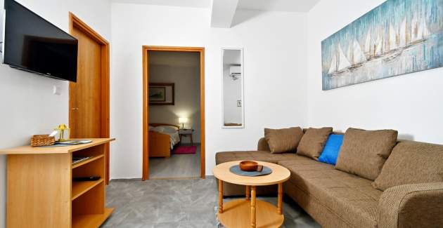 Apartments Novotny - Ein Schlafzimmer mit Terrasse - Zuti