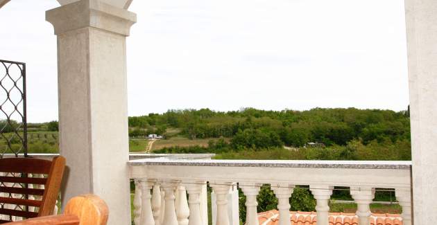 Ferienwohnung Marija Kastelir mit Balkon und Gartenblick