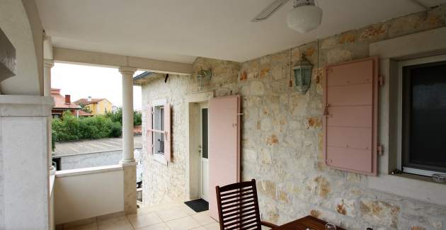 Ferienwohnung Marija Kastelir mit Balkon und Gartenblick