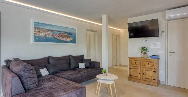 A5 / Appartamento con tre camere da letto e piscina in comune