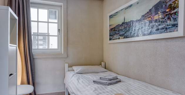 A5 / Appartamento con tre camere da letto e piscina in comune