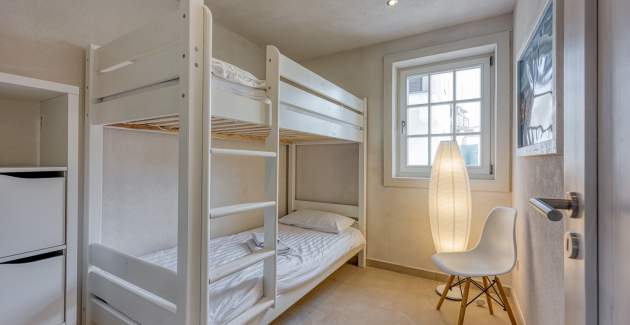 A5 / Appartamento con tre camere da letto e piscina in comune