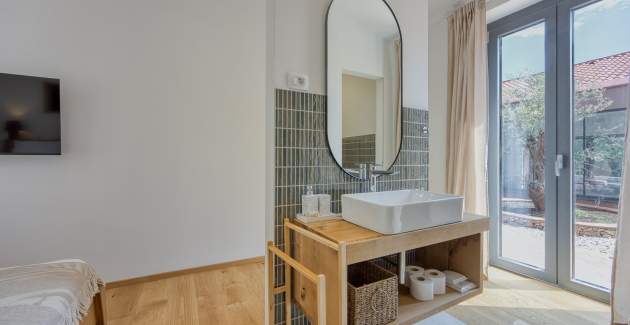 Case Atrio / Casa Nini