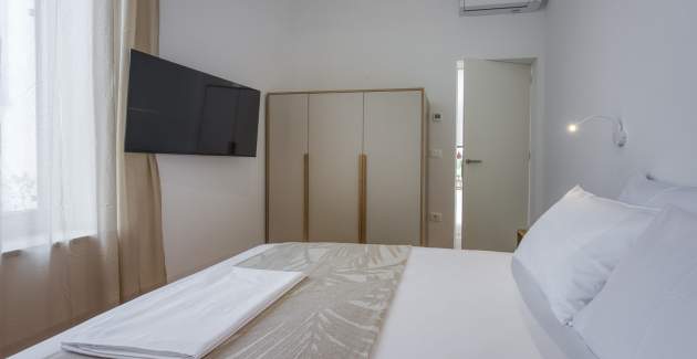 Case Atrio / Casa Nini