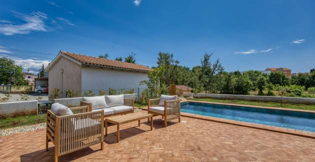 Case Atrio / Casa Nini
