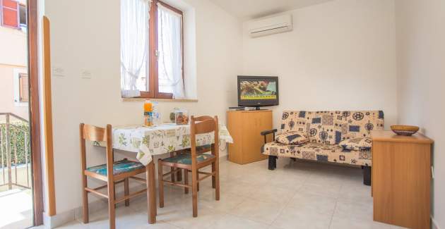 Ferienwohnung Punta IV mit Gartenblick