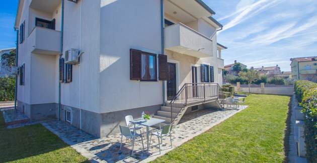 Ferienwohnung Punta IV mit Gartenblick