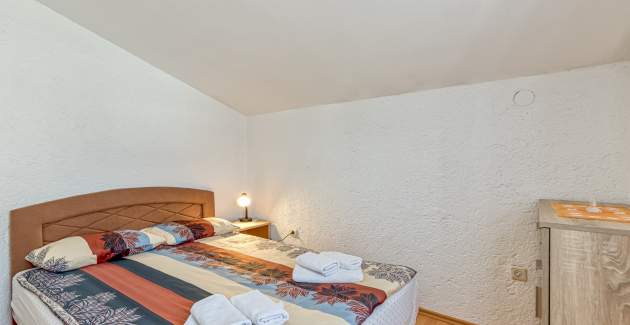 Ferienwohnung Slavko Cancini mit 2 Schlafzimmern und Balkon