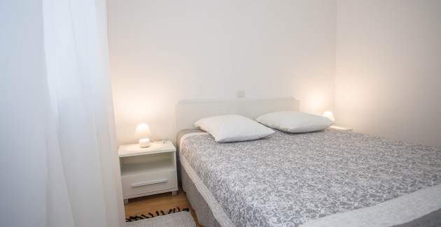 Appartamento Koraca con 2 camere da letto e balcone vicino a Sveti Lovreč